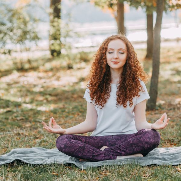 Person meditating in a serene environment, symbolizing mental clarity.